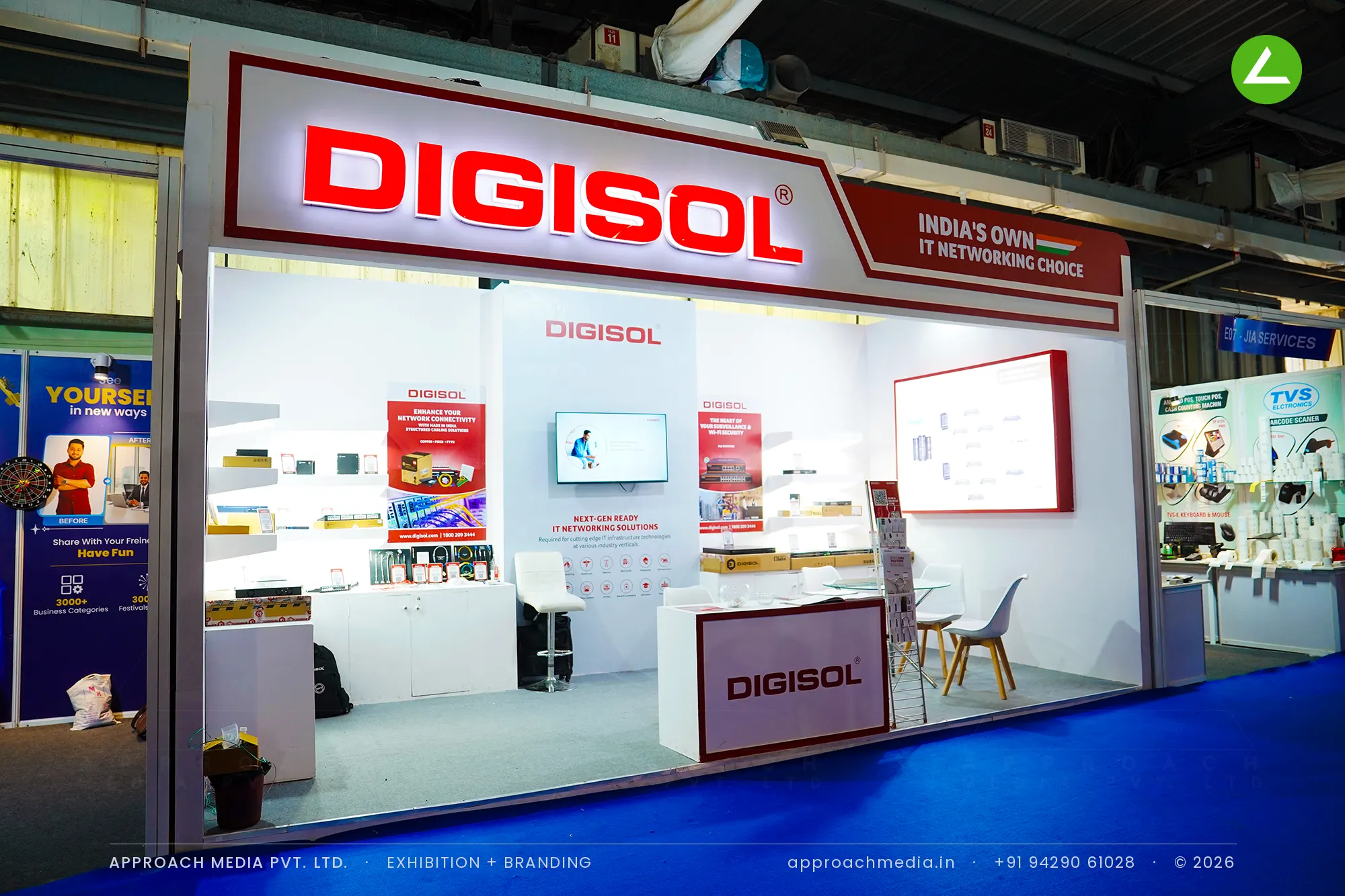 DIGISOL exhibition stall design at FITAG Tech Expo Gandhinagar with red backlit fascia and lit white product shelves