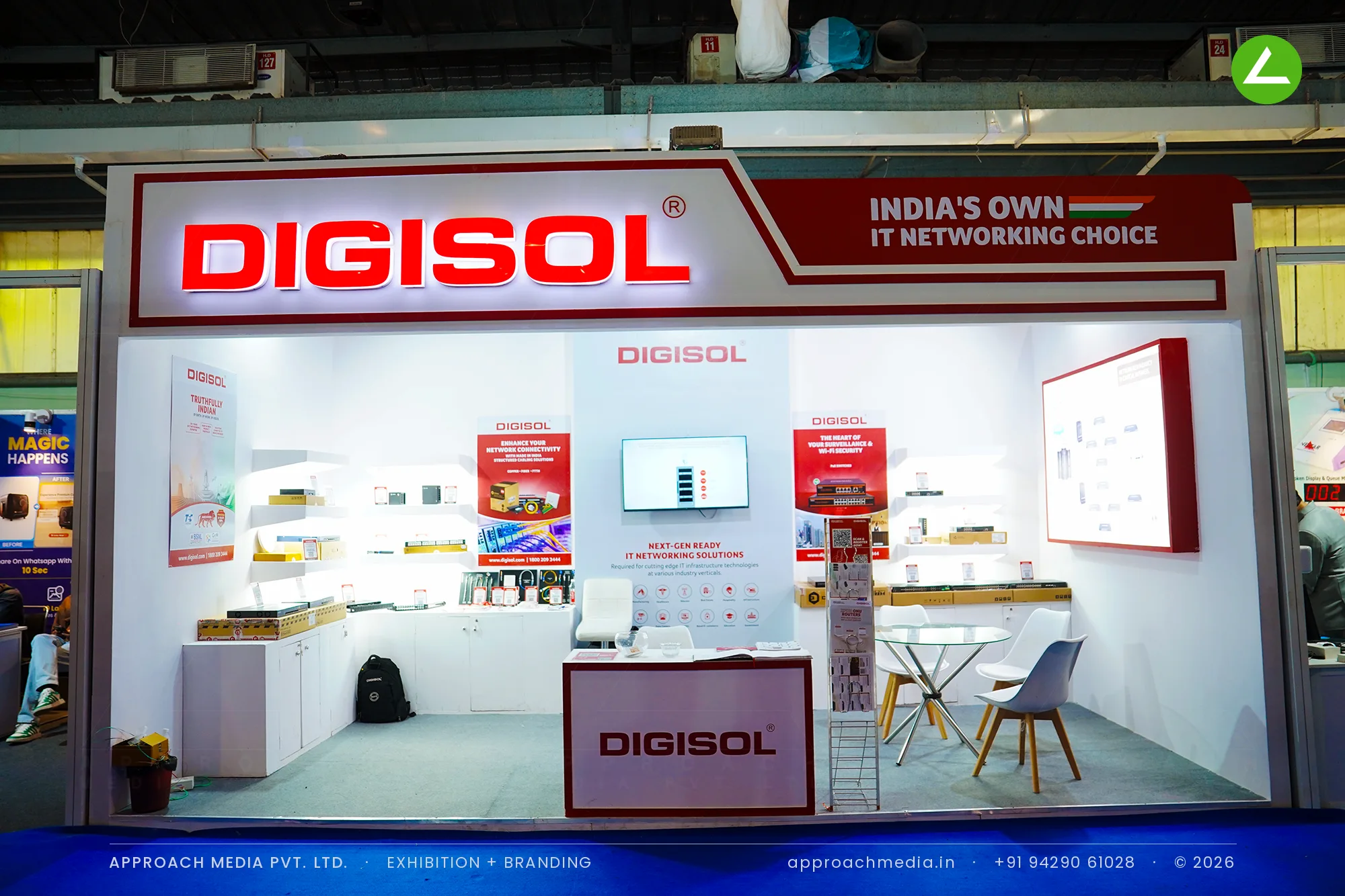 DIGISOL exhibition stall design at FITAG Tech Expo Gandhinagar: a lit product wall in 18 sqm — photo 2