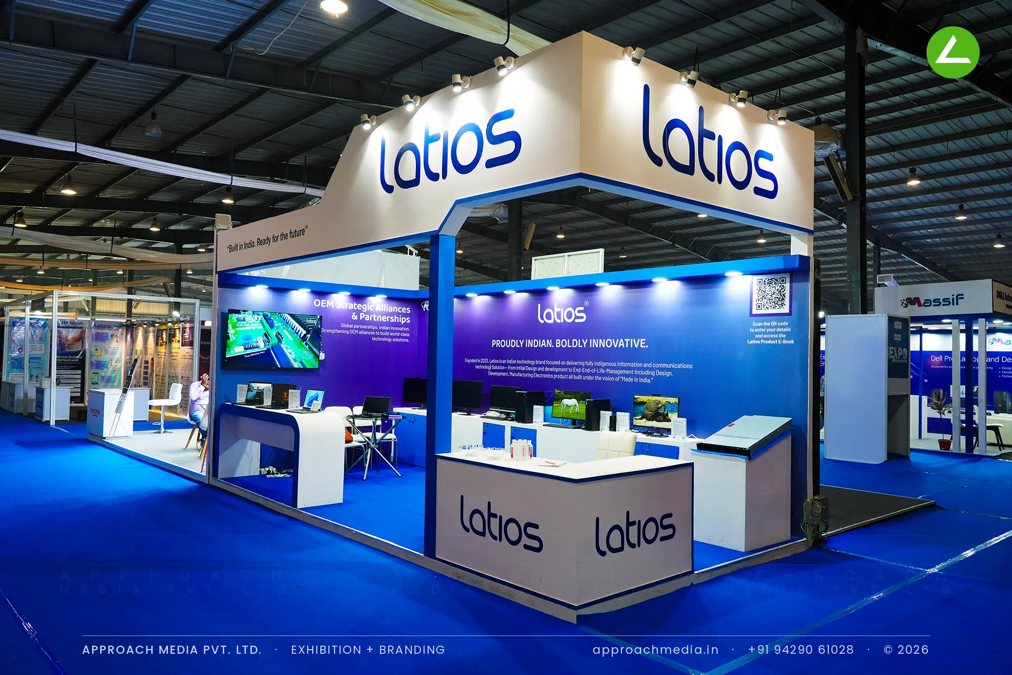 Latios exhibition stall design at FITAG Tech Expo Gandhinagar with raised cream header and blue gradient rear wall