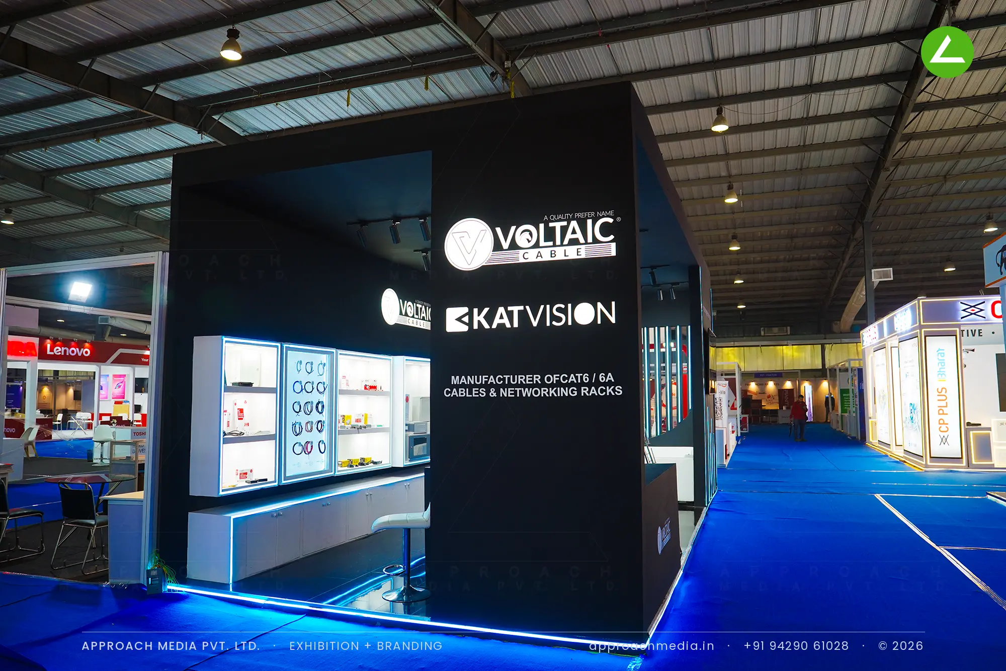 Voltaic Cable exhibition stall design at FITAG Tech Expo Gandhinagar: black walls, lit vitrines — photo 4