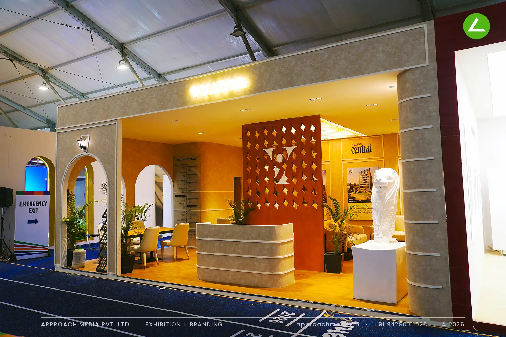 9 Yards exhibition stall design at GIHED Property Show Ahmedabad: an arched villa frontage — photo 3