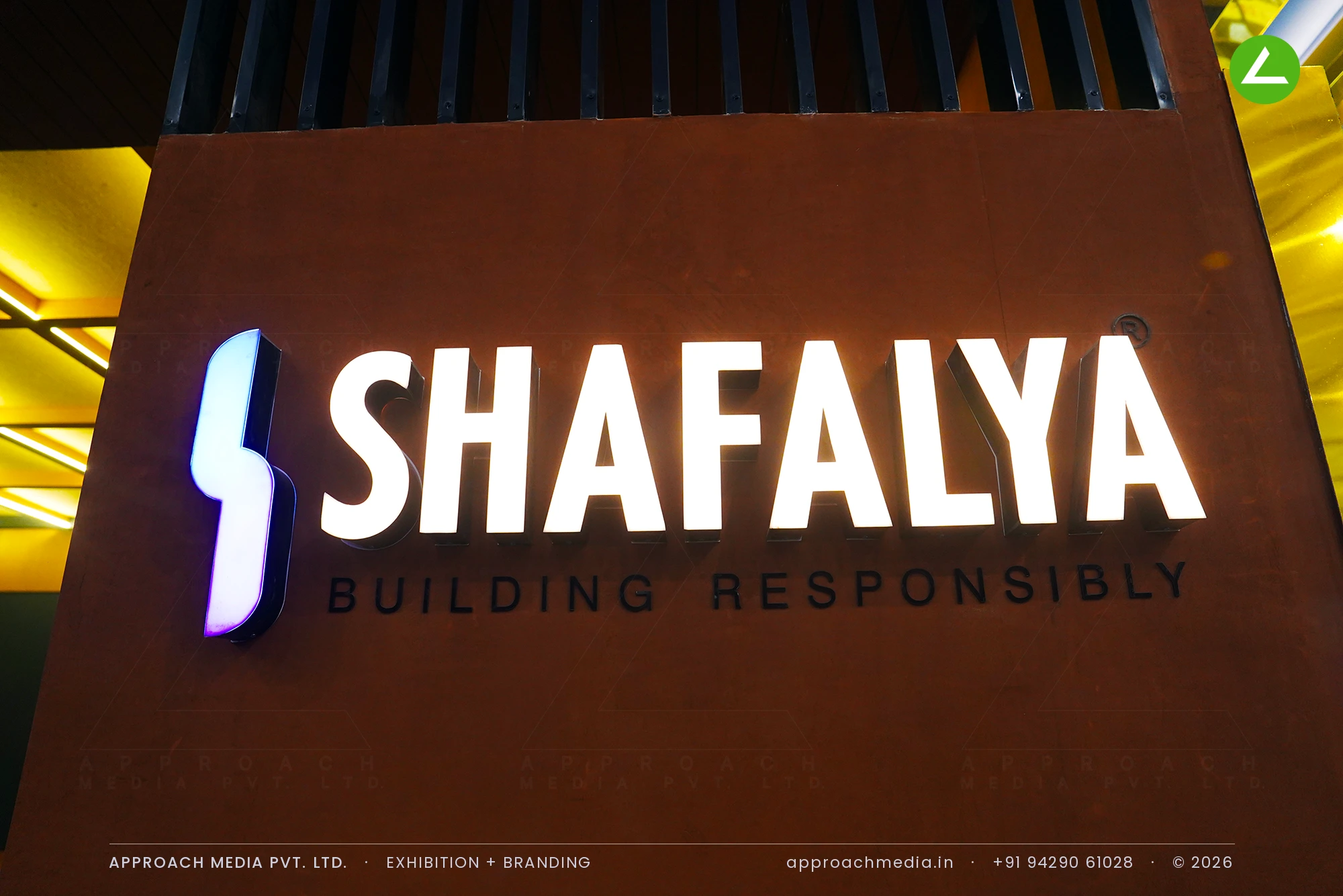 Shafalya exhibition stall design at GIHED Property Show Ahmedabad: 72 sqm under a lit ceiling grid — photo 2