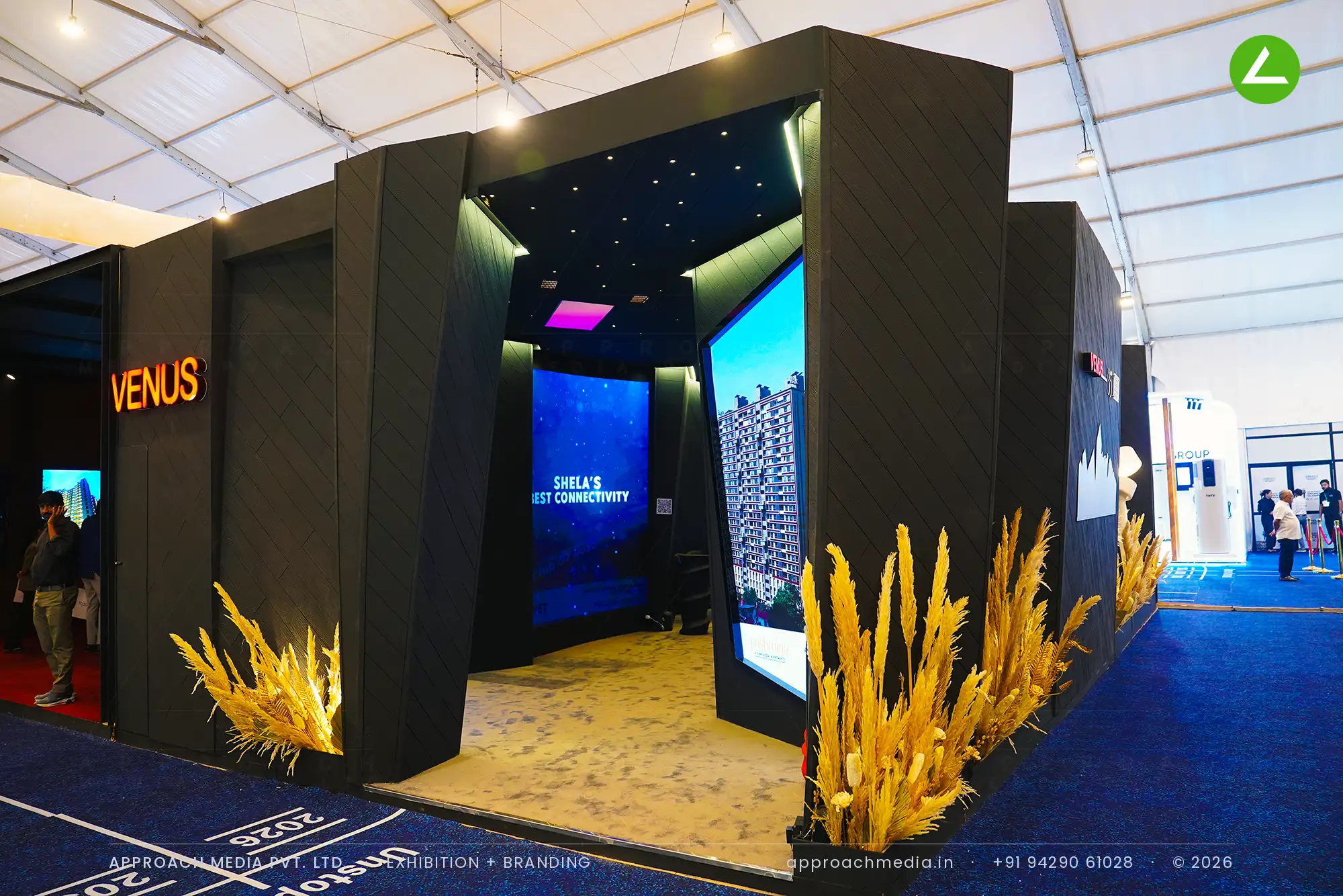 Venus at GIHED Property Show Ahmedabad - Dark, Cinematic Exhibition Stall Design — photo 4