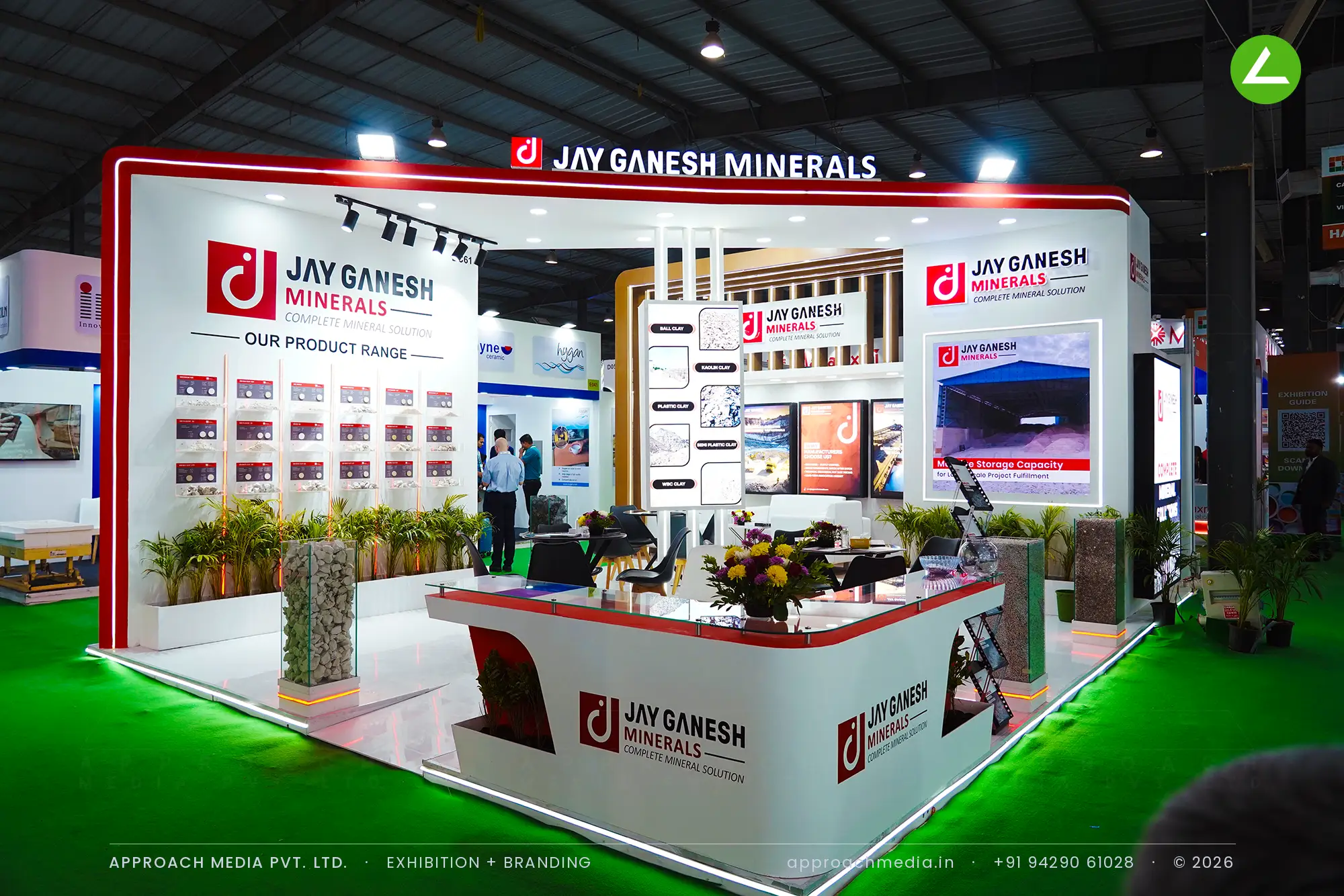 Jay Ganesh Minerals exhibition stall design at Indian Ceramics Asia Gandhinagar, clay sample wall and curved fascia