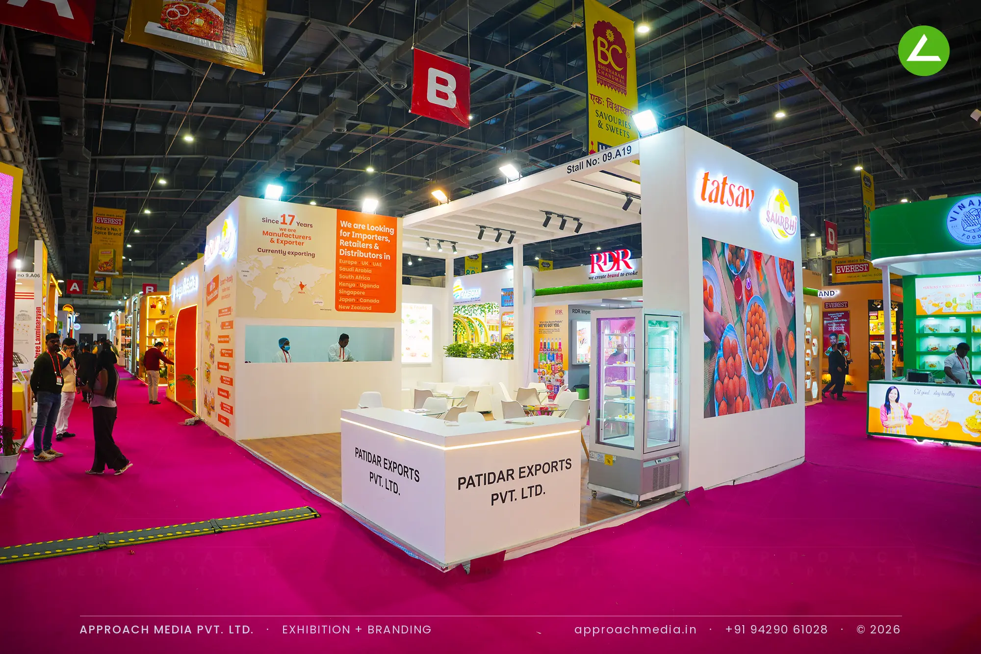Patidar Exports exhibition stall design at Indusfood Greater Noida with backlit brand logos and printed food panel
