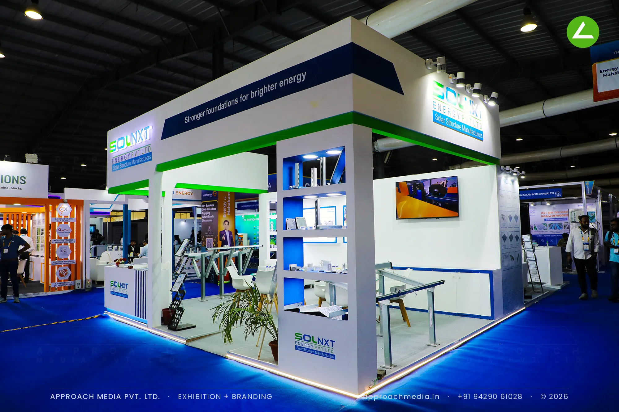 Solnxt Energy exhibition stall design at Intersolar India Gandhinagar with lit component niches and a mounting frame