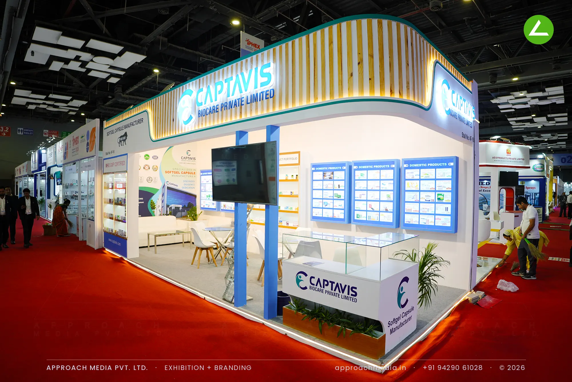 Captavis corner stand with wave timber fascia and backlit panels, exhibition stall design at IPHEX New Delhi