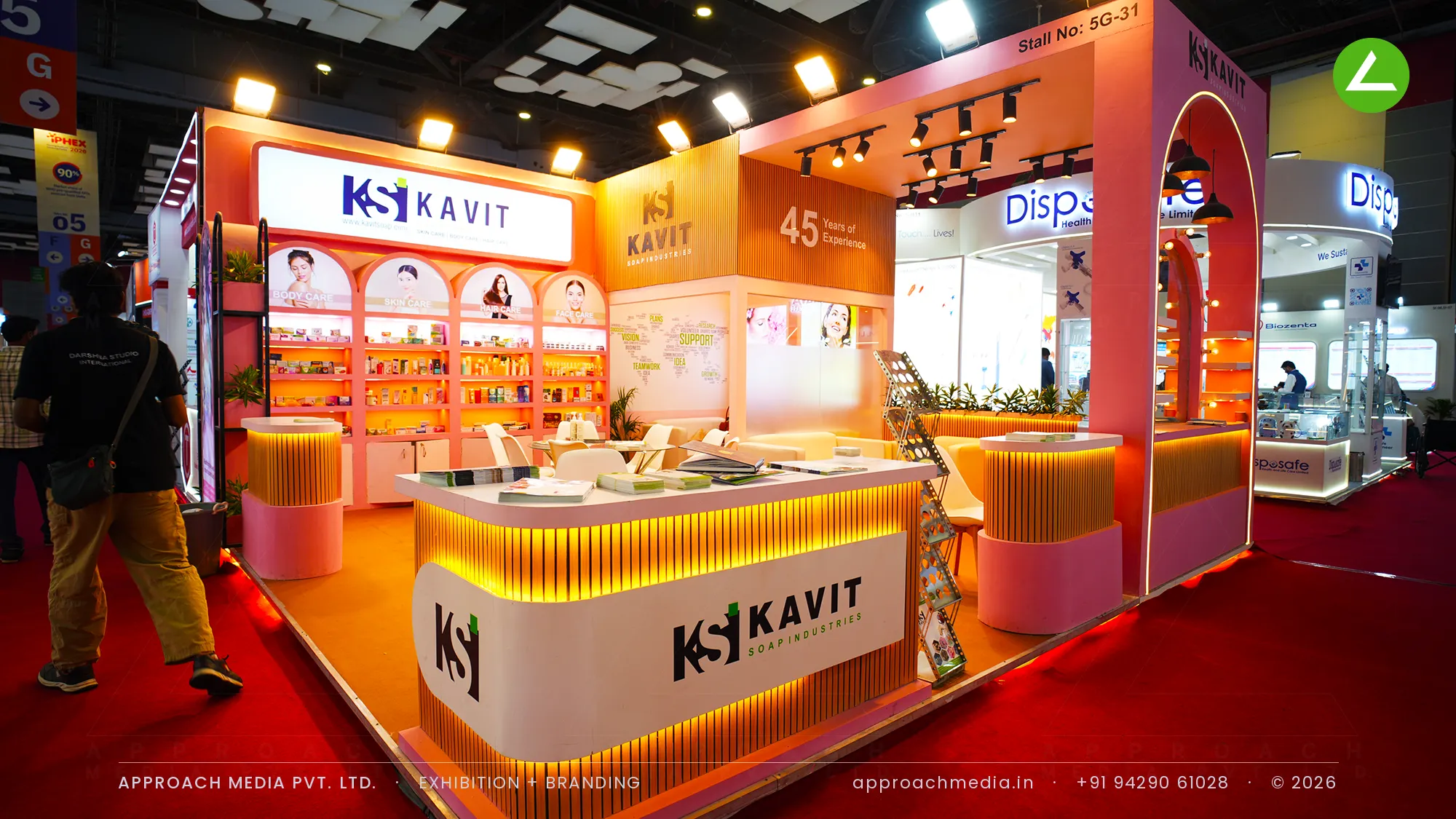 Kavit Soap Industries coral stand with fluted counter and arched shelves, exhibition stall design at IPHEX New Delhi