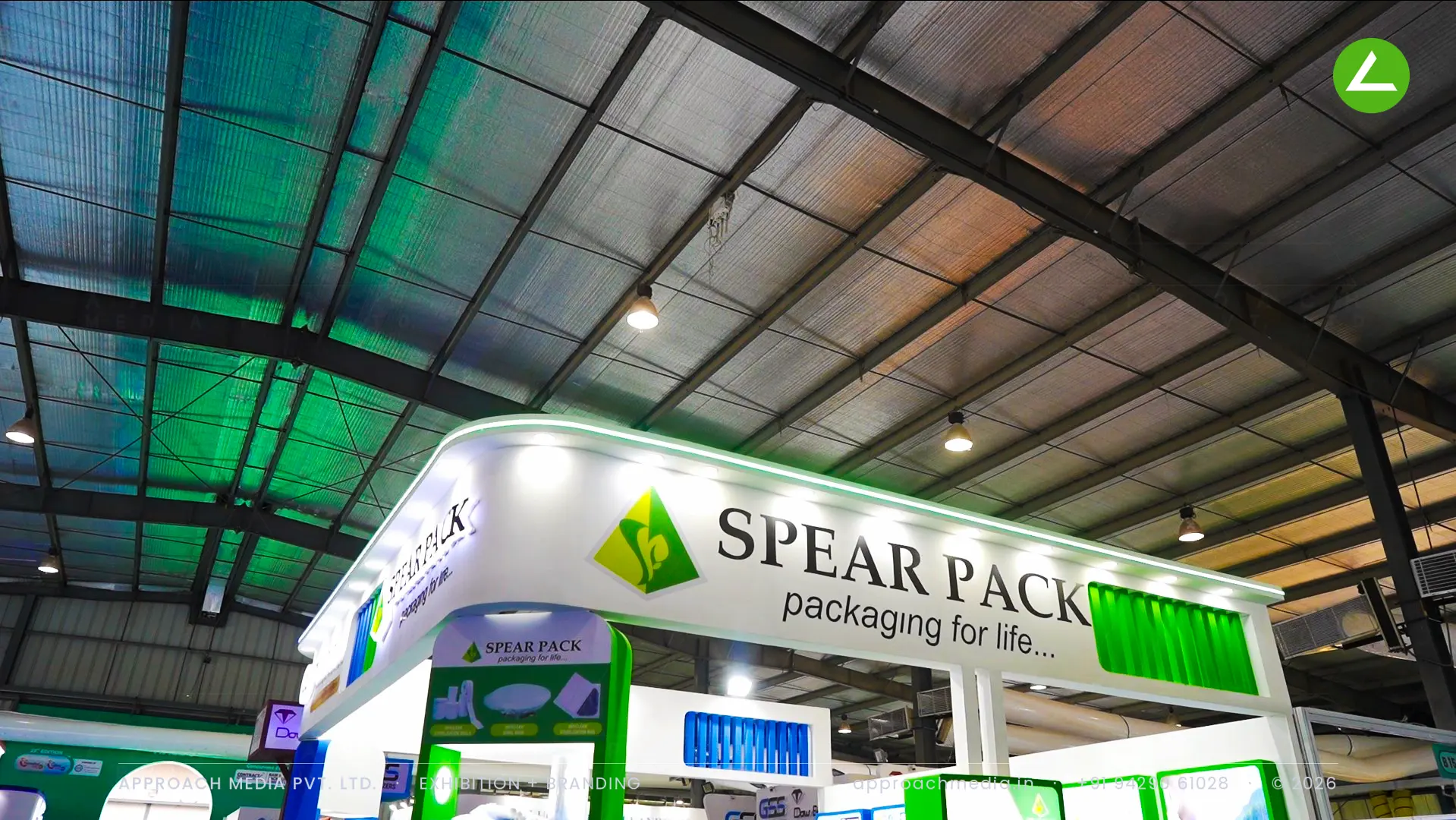 Superpack at Pharmatech Expo Gandhinagar 2026 — 36 sqm Exhibition Stall Design in Backlit Green — photo 2