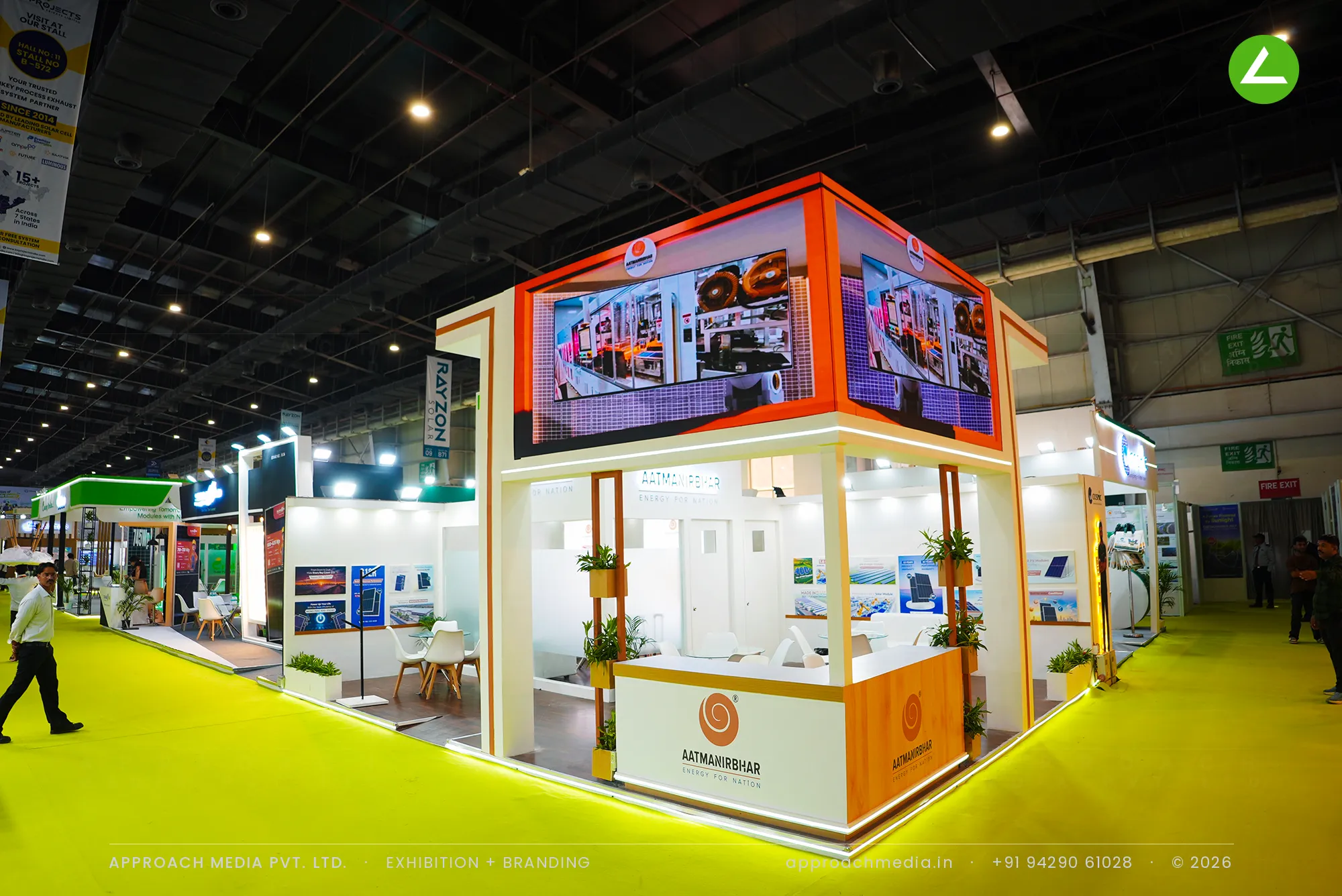 Exhibition stall design at REI Greater Noida: Aatmanirbhar Solar corner stand with a raised LED video cube