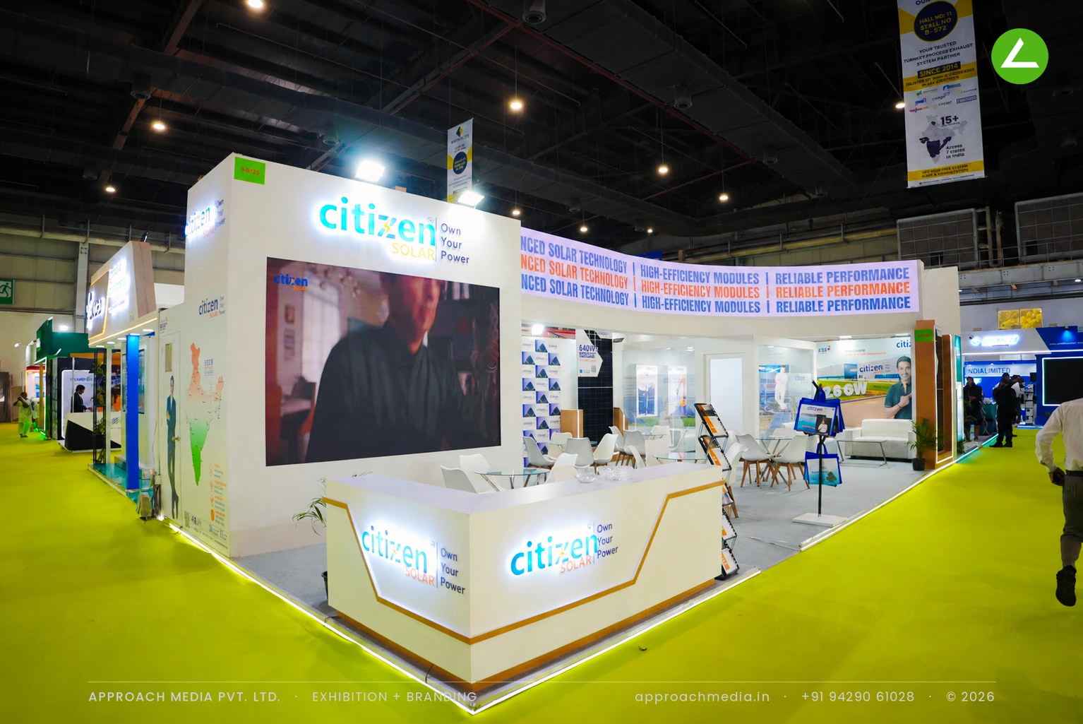 Exhibition stall design at REI Greater Noida: Citizen Solar stand with a full-height LED video wall
