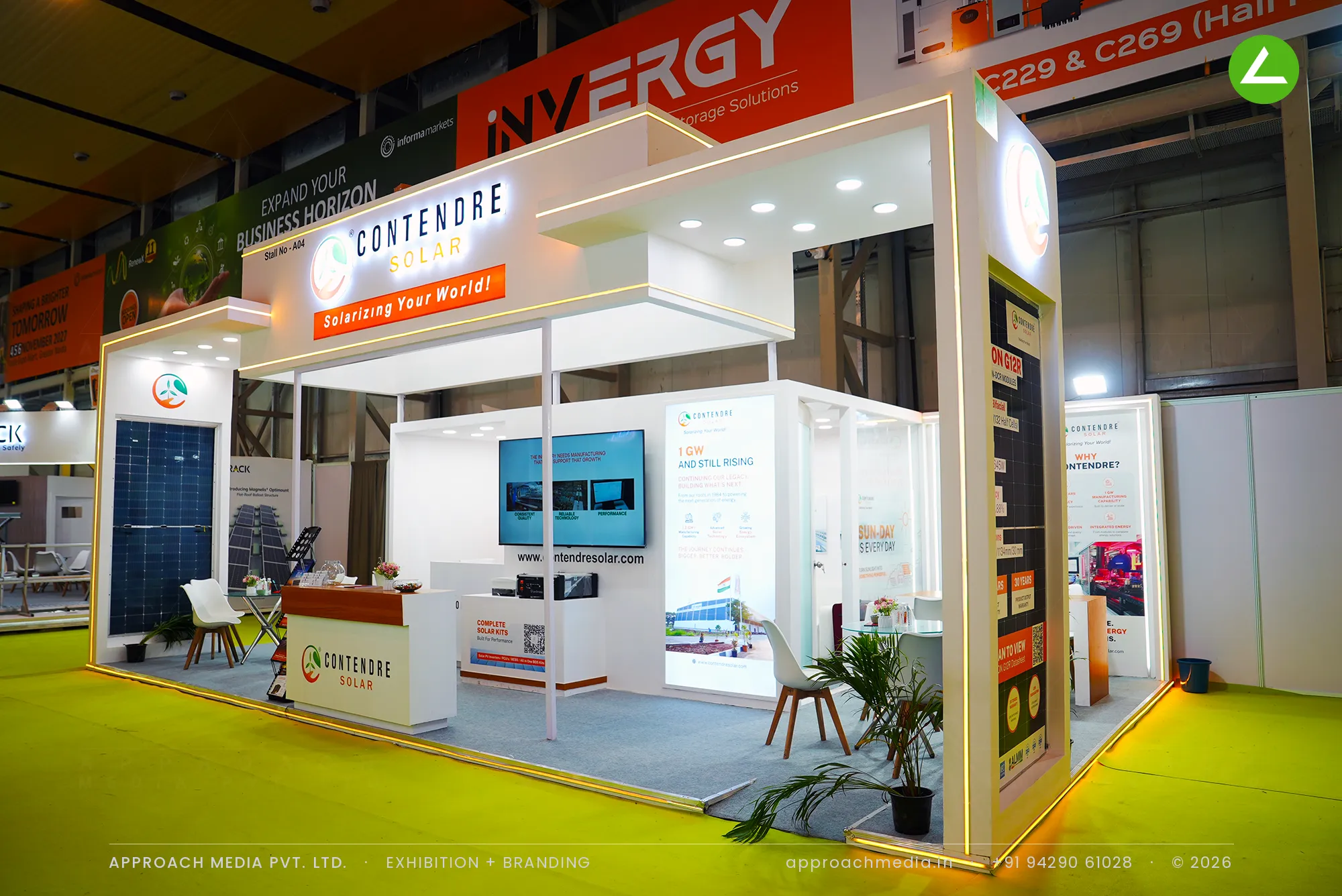 Exhibition stall design at REI Greater Noida: Contendre Solar white portal frame outlined in warm light
