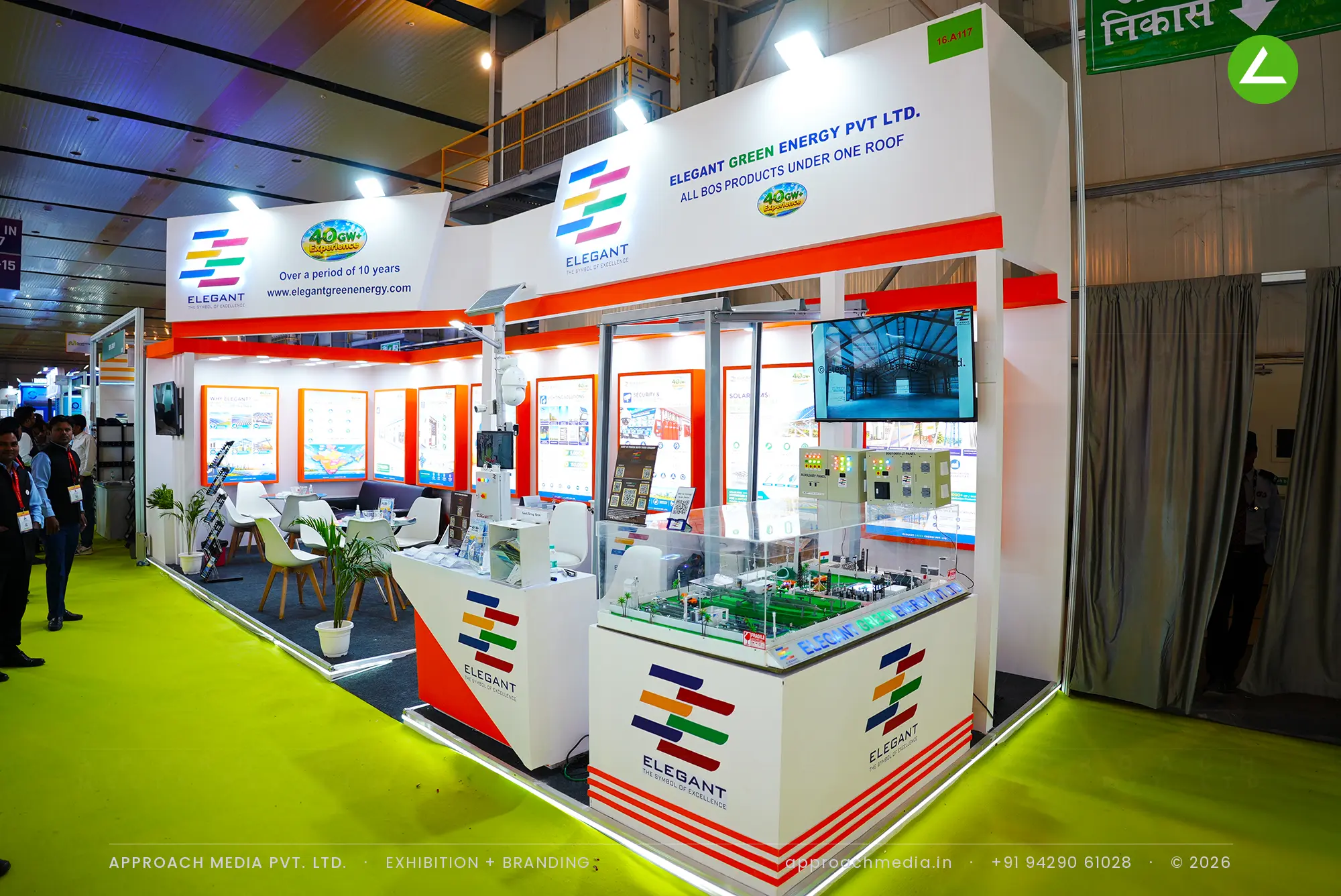 Exhibition stall design at REI Greater Noida: Elegant Green Energy stand with a glass-cased plant model