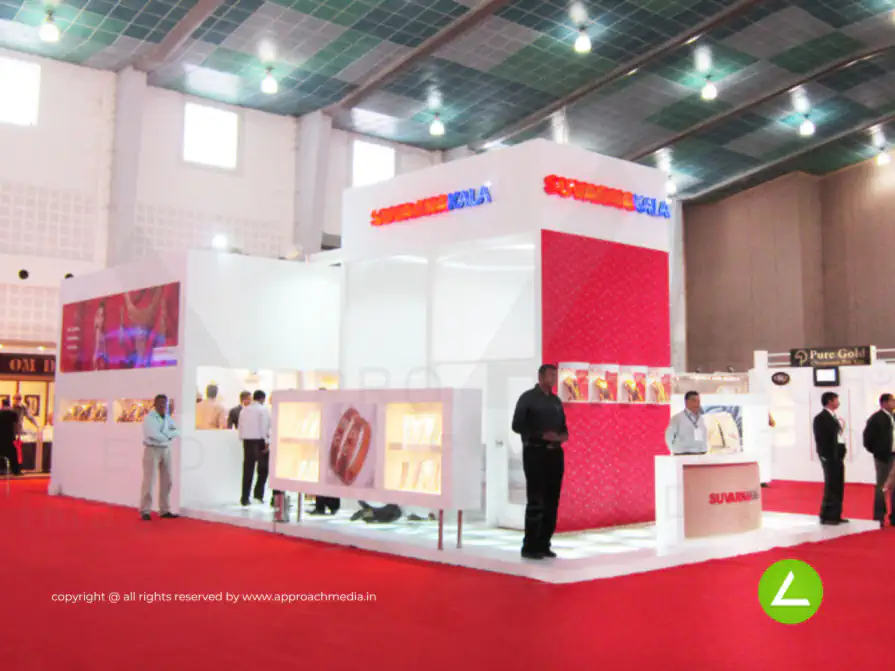 Gold Jewellery Exhibition Stall Design at GGJS Ahmedabad — 60 sqm 3 side open trade show booth for Suvarnakala at GGJS (Gujarat Gem & Jewellery Show)